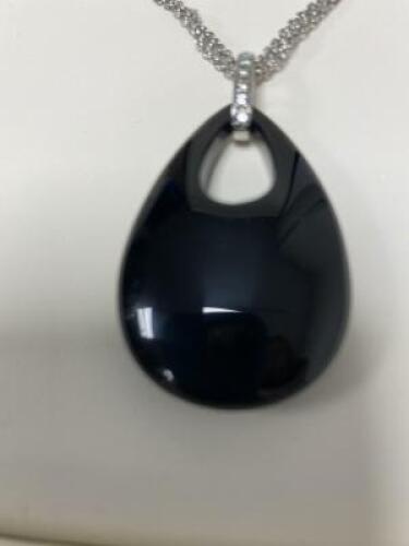 Onyx & Diamond Pendant with 14" Silver chain. Stamped 925