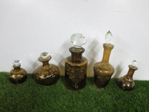 Set of 5 Bronze Coloured, Decorated Bottles with Stoppers, All Different Sizes and Shapes.