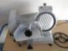 Lot withdrawn: Buffalo Meat Slicer, Model CD277-03, S/N 0320029609660. - 2