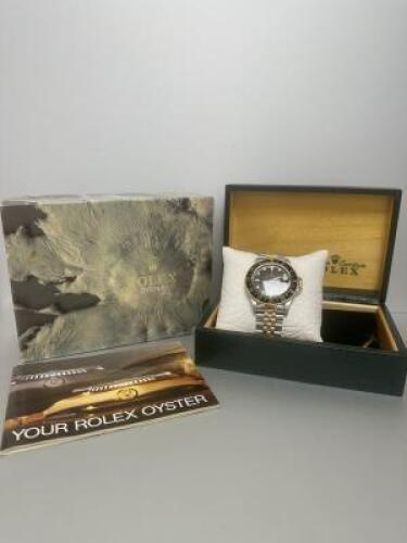 Rolex GMT-Master&nbsp;16753, 40mm. Stainless Steel & Yellow Gold Case with Black Dial and Bezel. In Original Box with Brochure, No Papers. S/N 8940662.
