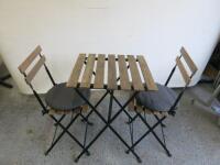 Tarno Wooden Slatted Table with 2 x Tarno Chairs & Cushions. Size H75 x W55 x D55cm.