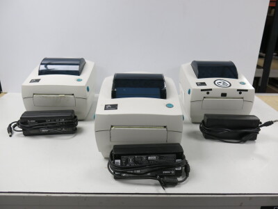 3 x Zebra Desk Top Label Printer, Model GC420d. Comes with 3 Power Supplies.