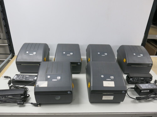 6 x Zebra Desk Top Thermal Label Printer, Model ZD220. Comes with 4 Power Supplies.