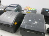 7 x Assorted Label Printers to Include: 5 x Zebra ZD220, 1 x Zebra 450 (note: broken facia) & 1 x TSC DA210. Comes with 3 Power Supplies. - 2