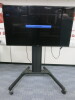 Samsung 65" TV, Model ME65MB. Comes with Remote Control, Actiontec Screenbeam & Mobile Trolley TV Stand.