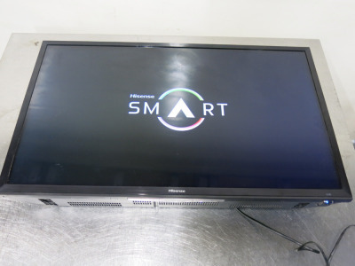 Hisense Smart 32" LED Backlit TV, Model H32M2600. NOTE: requires remote & wall bracket.