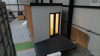 15.3m x 2.62m - Ex-Show Room Modular Housing Display Unit with Brick Front Finish, 2 Rendered Ends with Finish Required Top & Rear. Unit Sits on 2 x Sets of 6 Wheeled Galvanised Mobile Frames (7 x 3m). Fitted with Kitchen, Toilet, Shower room & Bedroom, A - 2