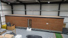 15.3m x 2.62m - Ex-Show Room Modular Housing Display Unit with Brick Front Finish, 2 Rendered Ends with Finish Required Top & Rear. Unit Sits on 2 x Sets of 6 Wheeled Galvanised Mobile Frames (7 x 3m). Fitted with Kitchen, Toilet, Shower room & Bedroom, A