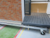 15.3m x 2.62m - Ex-Show Room Modular Housing Display Unit with Brick Front Finish, 2 Rendered Ends with Finish Required Top & Rear. Unit Sits on 2 x Sets of 6 Wheeled Galvanised Mobile Frames (7 x 3m). Fitted with Kitchen, Toilet, Shower room & Bedroom, A - 9