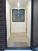 15.3m x 2.62m - Ex-Show Room Modular Housing Display Unit with Brick Front Finish, 2 Rendered Ends with Finish Required Top & Rear. Unit Sits on 2 x Sets of 6 Wheeled Galvanised Mobile Frames (7 x 3m). Fitted with Kitchen, Toilet, Shower room & Bedroom, A - 11