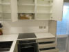 15.3m x 2.62m - Ex-Show Room Modular Housing Display Unit with Brick Front Finish, 2 Rendered Ends with Finish Required Top & Rear. Unit Sits on 2 x Sets of 6 Wheeled Galvanised Mobile Frames (7 x 3m). Fitted with Kitchen, Toilet, Shower room & Bedroom, A - 24