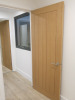 15.3m x 2.62m - Ex-Show Room Modular Housing Display Unit with Brick Front Finish, 2 Rendered Ends with Finish Required Top & Rear. Unit Sits on 2 x Sets of 6 Wheeled Galvanised Mobile Frames (7 x 3m). Fitted with Kitchen, Toilet, Shower room & Bedroom, A - 33