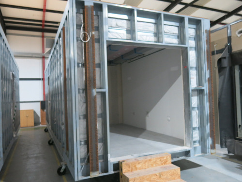 9.3 x 3.1m - Galvanised Steel Carcass, Part Finished Modular Building with First Fix Electrics & Ventilation Established. Includes 2 Rooms & Middle Utilities Area with 3 Entrance Ways. Overall Size H3m x 9.3m x 3.1m. MOBILE FRAMES NOT INCLUDED.