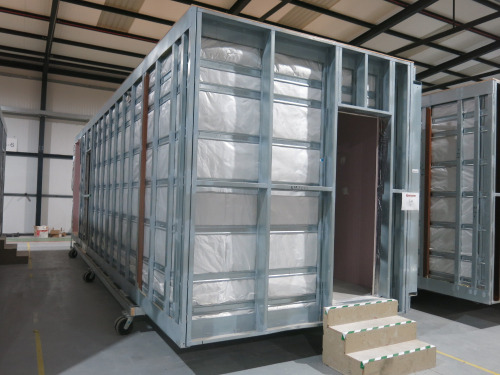 9.9m x 2.8m - Galvanised Steel Carcass, Part Finished Modular Building. Unit Comprises of Open Ended Porch Area with Cupboard Inset, Main Room with 2 Entrance Doorways and Smaller Separate Room. Overall Size H3m x 9.9m x 3m. NOTE: adaptable to suite other