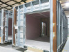9.3m x 3.3m - Galvanised Steel Carcass, Part Finished Modular Building. Includes 2 Rooms & Middle Utilities Area with 4 Entranceways. Overall Size H3m x 9.3m x 3.3m. NOTE: adaptable to suite other layouts as required (Layout Matches Lot 6). MOBILE FRAME N - 2