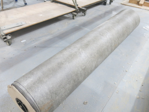 Part Used Roll of 2m Wide Grey Stone Style Felt Back Laminate (Length Unknown).