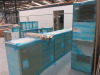 Large Quantity of Kitchen Cabinets, Doors, Fixtures & Fittings to Include: 53 x Assorted Cupboard Carcasses, 11 x Laminate Worktops (61.5 x 3m) & 69 x Luncas Door Panels & End Panels with Assorted Plinths, Fixtures & Fittings. Comes with 2 x Worktop Jigs. - 10