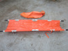 Folding Emergency Stretcher in Orange.