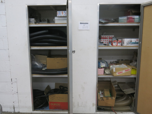 Stock of Assorted Electrical Components & Parts to Include: Cable Conductors, Consumer Unit Switches, Wiring Accessories Multi Pole Distribution Boxes, Bails of Black Flexi Conduit & More (As Viewed). LOCATED IN 2 WALL CUPBOARDS AT REAR OF SHED 1.