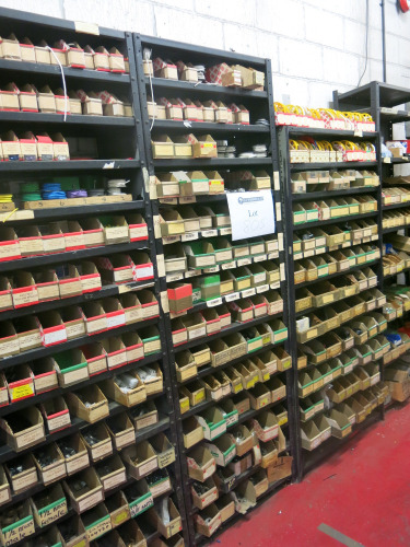 4 x Bays of Approx 50 Shelves with Large Stock of Electrical Wiring Accessories to Include: Cable Markers, Earthing/Conductor Fixings, Conduit Brackets, Terminal Blocks, Brass & Other Conduit Fittings & More (As Viewed). LOCATED IN STORES PASSAGE AT REAR 