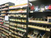 4 x Bays of Approx 50 Shelves with Large Stock of Electrical Wiring Accessories to Include: Cable Markers, Earthing/Conductor Fixings, Conduit Brackets, Terminal Blocks, Brass & Other Conduit Fittings & More (As Viewed). LOCATED IN STORES PASSAGE AT REAR - 2