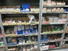 8 x Bays of Racking & 3 Shelves to Rear with Assorted Electrical Spares, Parts & Consumables to Include: Consumer Unit Switches, Switches, Relay's, Voltmeters, Transformers, Back Boxes, 3 Phase Plugs, Buttons, Brass Nuts & Bolts, Crab's, Terminal Blocks & - 7