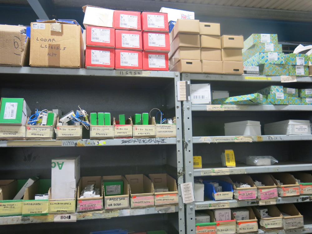 8 x Bays of Racking & 3 Shelves to Rear with Assorted Electrical Spares ...