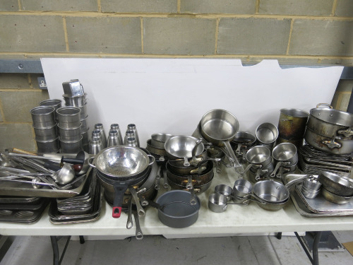 Large Quantity of Assorted Metal Kitchen Accessories to Include: Frying Pans, Sauce Pans, Baking Trays, Cream Chargers, Assorted Tools, etc ( As Viewed/Pictured).