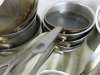 Large Quantity of Assorted Metal Kitchen Accessories to Include: Frying Pans, Sauce Pans, Baking Trays, Cream Chargers, Assorted Tools, etc ( As Viewed/Pictured). - 17