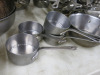Large Quantity of Assorted Metal Kitchen Accessories to Include: Frying Pans, Sauce Pans, Baking Trays, Cream Chargers, Assorted Tools, etc ( As Viewed/Pictured). - 18