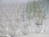 Approx 242 x Assorted Branded G & Co, Artner & Other Restaurant & Bar Glasses to Include: 33 x Champagne, 72 x Wine Glasses, 5 x Brandy, 7 x Cocktail, 100 x Water Glasses, 6 x Water Bottles, 6 x Milk Bottles & 3 x Wine Carafes. - 26