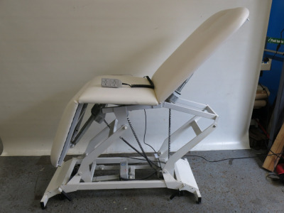 Electric 3 Section Remote Controlled Massage Table with Upper & Lower Reclining Sections.