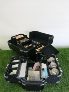 2 x Cosmetic Cases with an Assortment of Used Cosmetics to Include: Eye Shadow, Eye Liner Pencils & Cremes, Lash Perfect Extensions (As Viewed/Pictured).