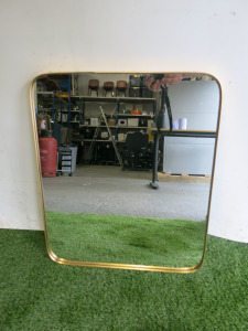 Brass Effect Oblong Wall Hung Mirror, Size H61 x W51cm. NOTE: damage to edge (As Viewed/Pictured).