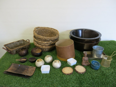 An Assortment of Shop Accessories to Include: 2 x Large Wooden Bowls, 2 x Wooden Sitting Buddhas, 1 x Red Glass Heart, 4 x Woven Baskets, Quantity of Stones in Leather Case, 3 x Tea Light Holders etc (As Viewed/Pictured).