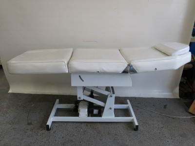 Electric 3 Section Remote Controlled Massage Table with Upper & Lower Reclining Sections with Head Rest. NOTE: requires remote & unable to power up A/F.
