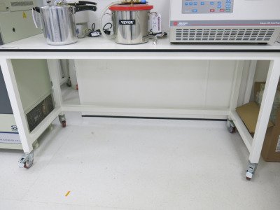 White Melamine Mobile Laboratory Workbench. Size H92 x W180 x D75cm.