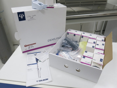 Box of Gilson Pipette Accessories to Include: 14 x Wall Hooks, Hanging Brackets, Manuals Etc (As Viewed).