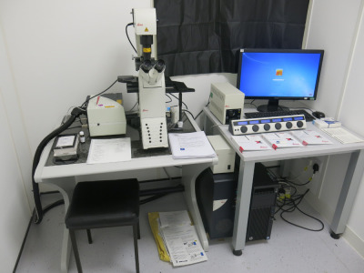 Leica DMi8 Automated Inverted Live Cell Microscope (Confocal) with Leica TCS SPE Laser and Leica Laser Emission, Leica EL6000 Shutter Light Intensity, Leica Bedienkonsole TCS-USB Version 2 Controller, CTR Compact & Leica TL LED. Mounted on Handbuch Marbl