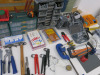 Table Containing an Assortment of Tools to Include: Spanners, Hacksaw & Blades, G Clamp, Hammers, Adjustable Spanners, Hole Saw Drill Bits, Crimpers, etc (As Viewed/Pictured). - 14