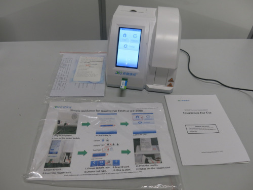 IFP Series Fluorescent Immunoanalyzer IFP-2000, S/N IFP2000210100. Comes with Power Supply, SARS-Cov-2 Antigen ID Chip, Quality Certificate, Control Card & Instructions. DOM 09/2021.