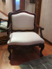 Oversized Ornate Carved Wooden Chair with Cream Fabric Padded Seat & Back.