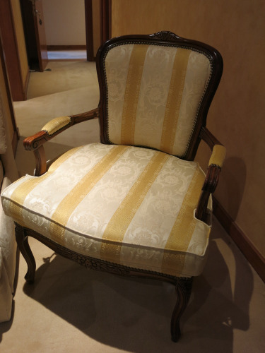 Large Wooden Framed Armchair in Green & Cream Fabric.