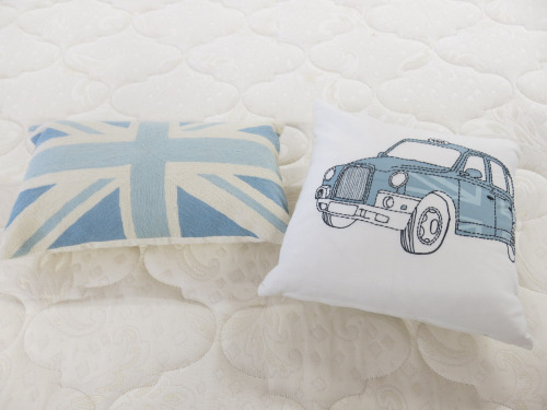 2 x Cushions in White & Blue with Union Jack & Taxi.