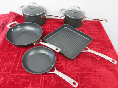 Set of 5 x Le Creuset Induction Pots & Pans to Include: 2 x Saucepan with Lids (18 & 20cm), Grill Pan (28cm) & 2 x Frying Pans (20 & 26cm). NOTE: appears with little use.