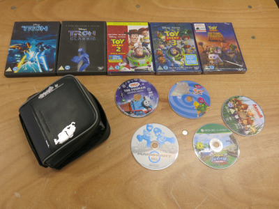 Large Assortment of Kids DVD's & Console Games in 2 Carry Cases.