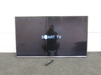 Samsung 55” TV, Model UE55JU700T. Comes with Remote.