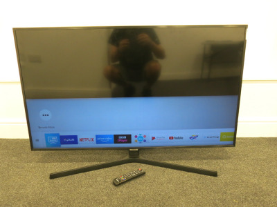 Samsung 59” TV, Model UE50NU74000U. Comes with Remote.