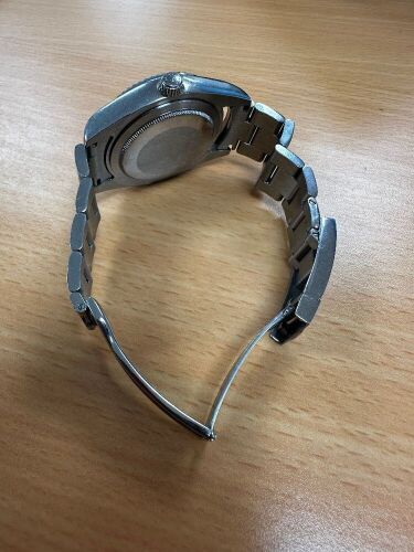 Stainless Steel Men's Watch with Light Blue Face.