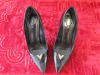 Pair of Louis Vuitton Black ladies High Heels with Gold V Motif. Size 38 1/2. Lightly Worn.